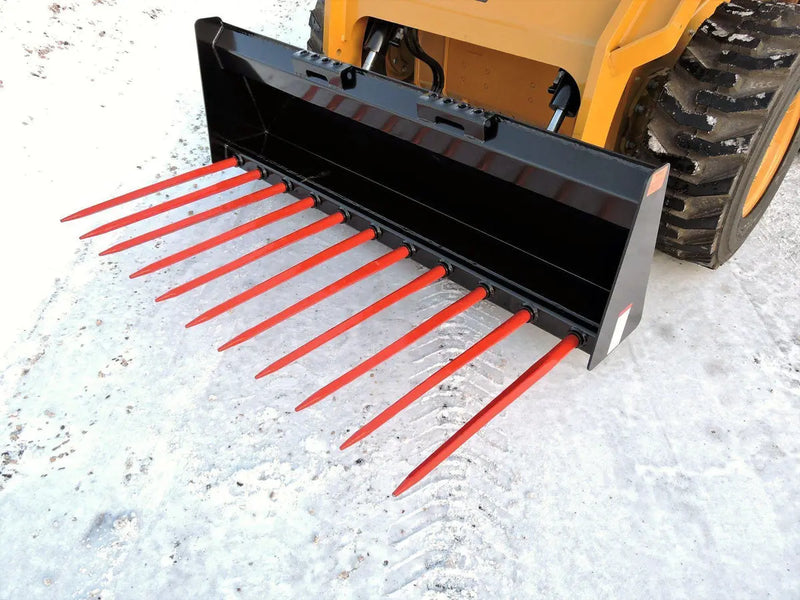 Load image into Gallery viewer, Close-up of the Master Tool Manure Fork by Berlon Industries in action, designed for both Skid Steer and Tractor applications.
