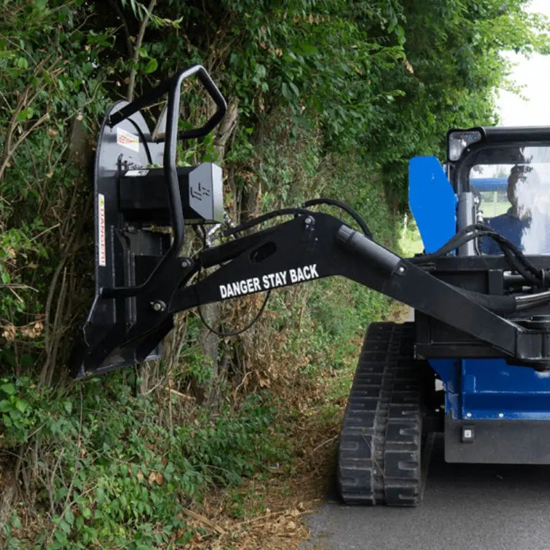 Load image into Gallery viewer, Experience the versatility of Blue Diamond&#39;s Skid Steer Swing Arm Brush Cutter, engineered for precise cutting in various terrains.
