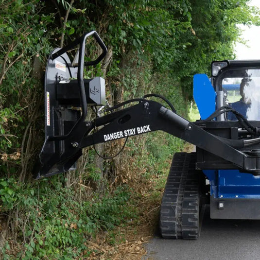 Experience the versatility of Blue Diamond's Skid Steer Swing Arm Brush Cutter, engineered for precise cutting in various terrains.